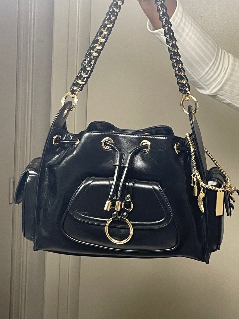 Steve Madden Black Leather Drawstring Dru Shoulder Bag with Gold Accents